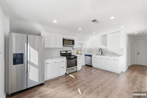 a front view of house with yard