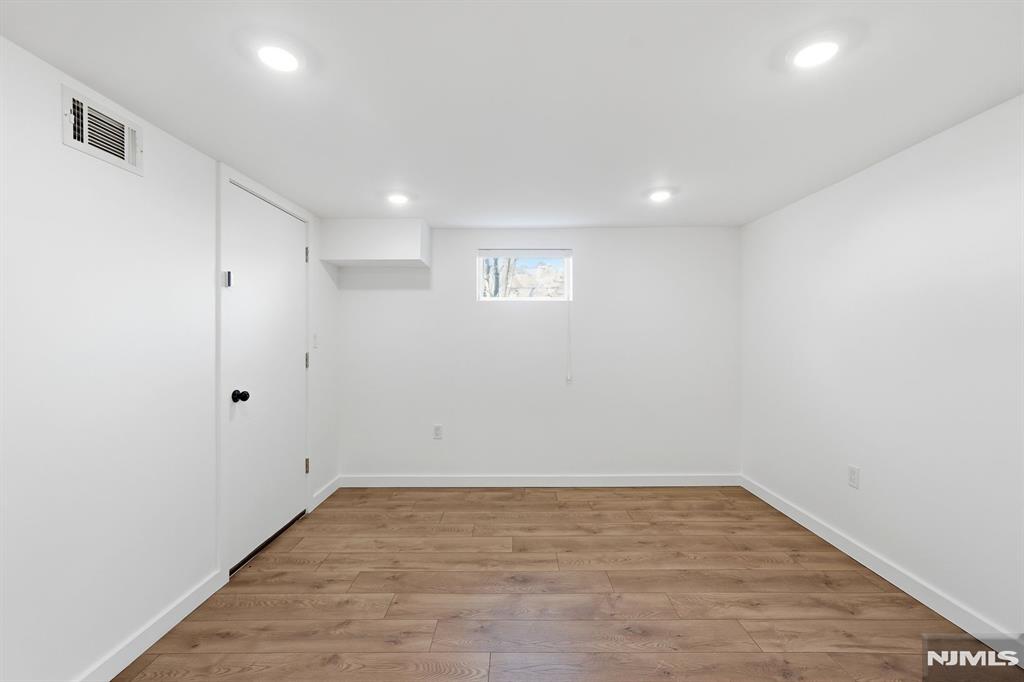 73 MacArthur Avenue Lodi, NJ 07644 - Photo 32 of 46 a view of an empty room