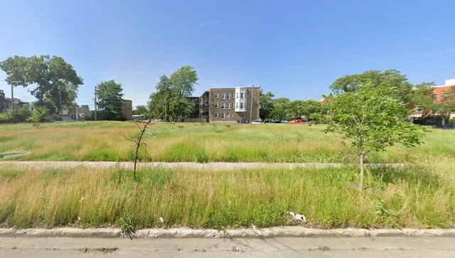 a view of a lake with a big yard
