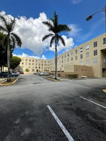 a view of a street with a building