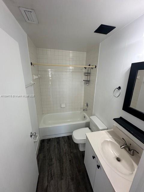 7420 West 20th Avenue, Unit 237 Hialeah, FL 33016 - Photo 26 of 34 a bathroom with a sink a toilet and a bathtub