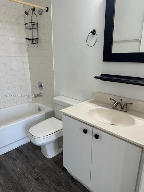 7420 West 20th Avenue, Unit 237 Hialeah, FL 33016 - Photo 27 of 34 a bathroom with a granite countertop toilet sink and mirror