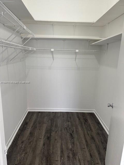 7420 West 20th Avenue, Unit 237 Hialeah, FL 33016 - Photo 34 of 34 a view of a room with wooden floor