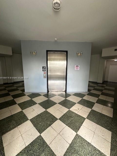 7420 West 20th Avenue, Unit 237 Hialeah, FL 33016 - Photo 5 of 34 a bathroom with a black and white checkered floor