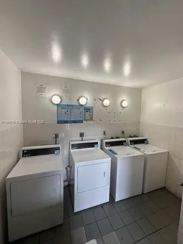 a kitchen with a stove and a sink