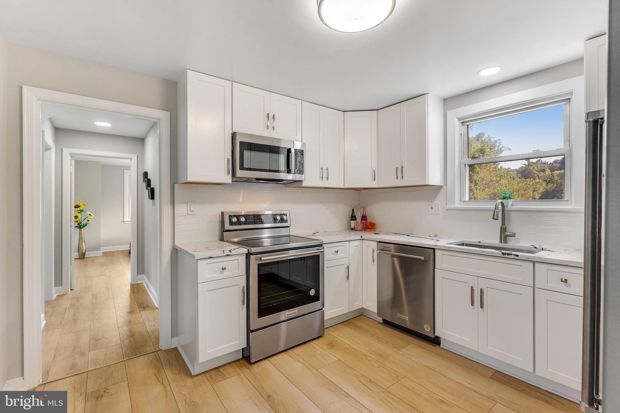 11410 Waples Mill Road Oakton, VA 22124 - Photo 20 of 62 Modern kitchen with sleek finishes.