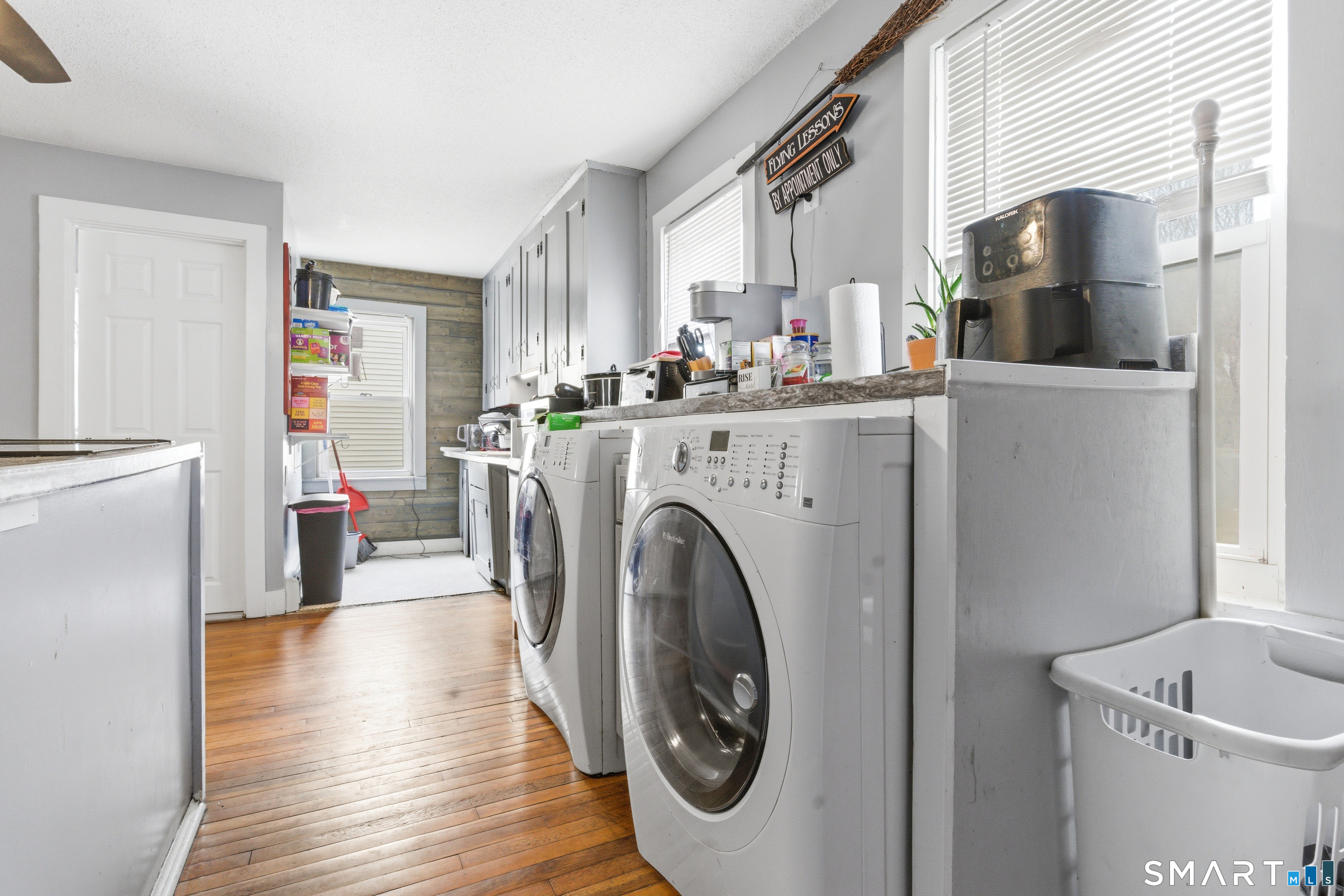 36 Church Street Killingly, CT 06241 - Photo 24 of 39 a view of kitchen and sink with washer and dryer