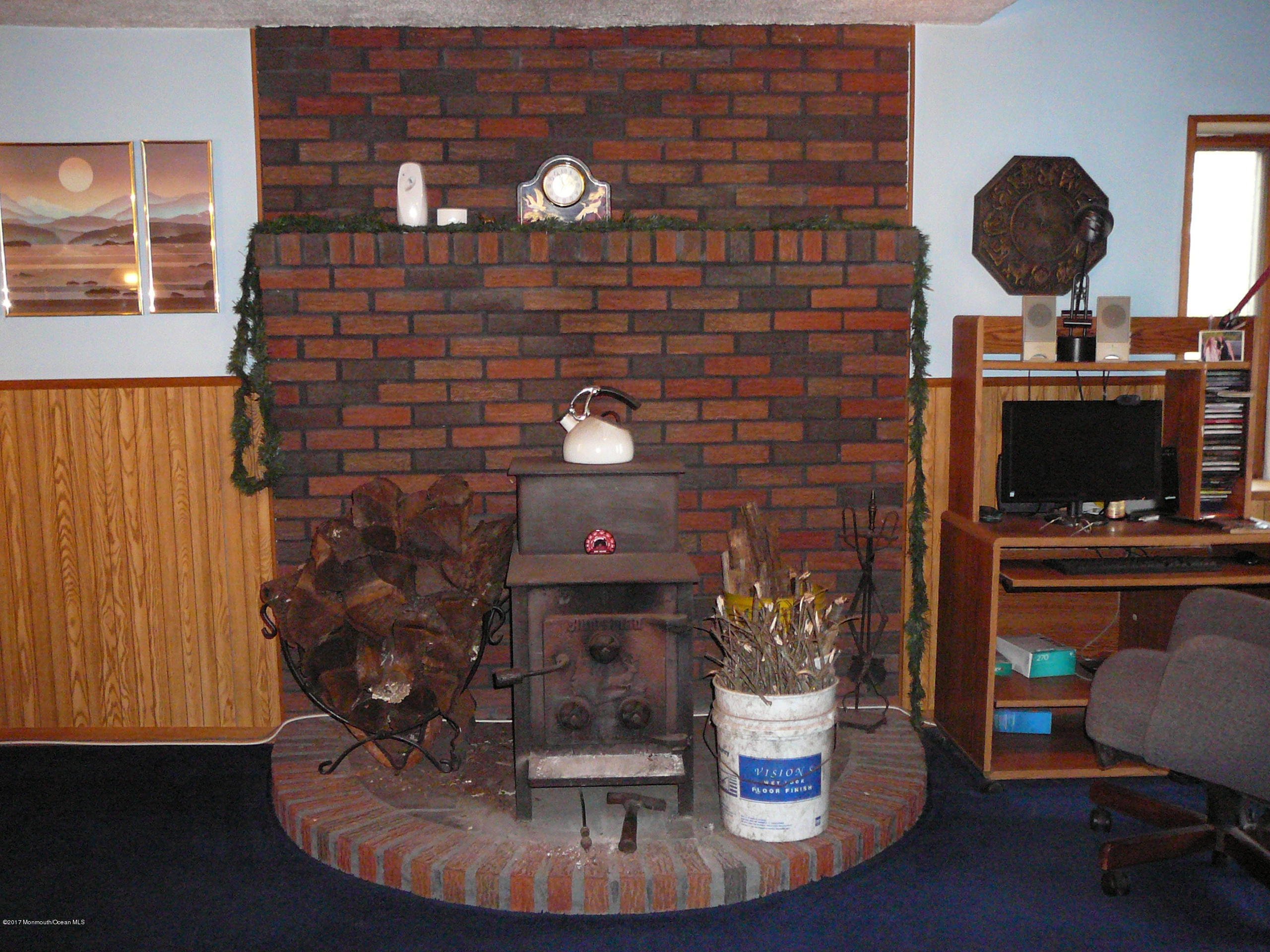 153 Colts Neck Road Farmingdale, NJ 07727 - Photo 18 of 18 18 wood stove