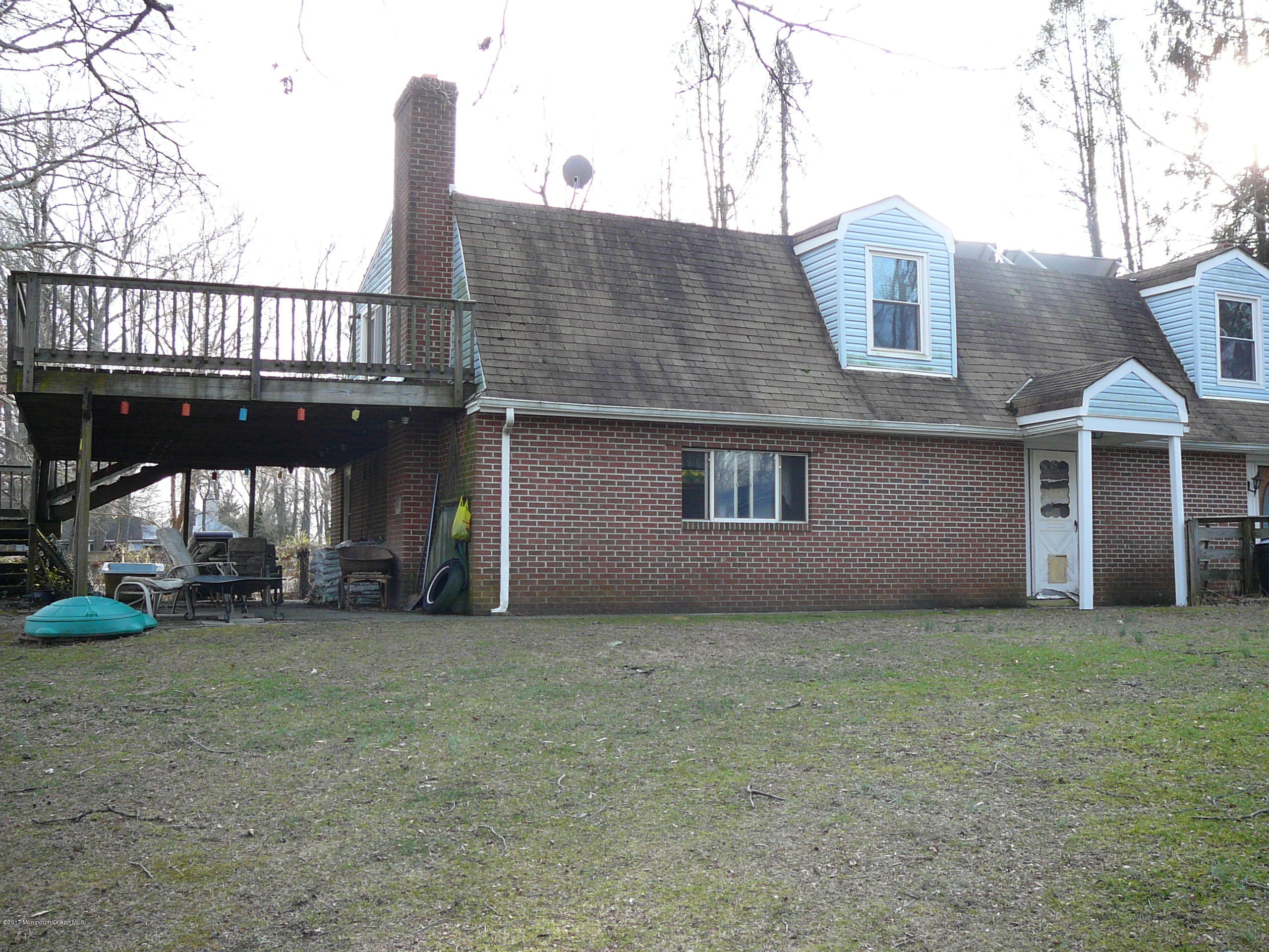 153 Colts Neck Road Farmingdale, NJ 07727 - Photo 8 of 18 house with deck
