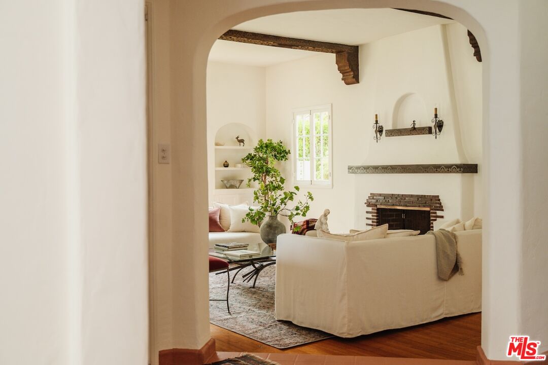 3325 Lowry Road Los Angeles, CA 90027 - Photo 12 of 73 a living room with furniture and a potted plant