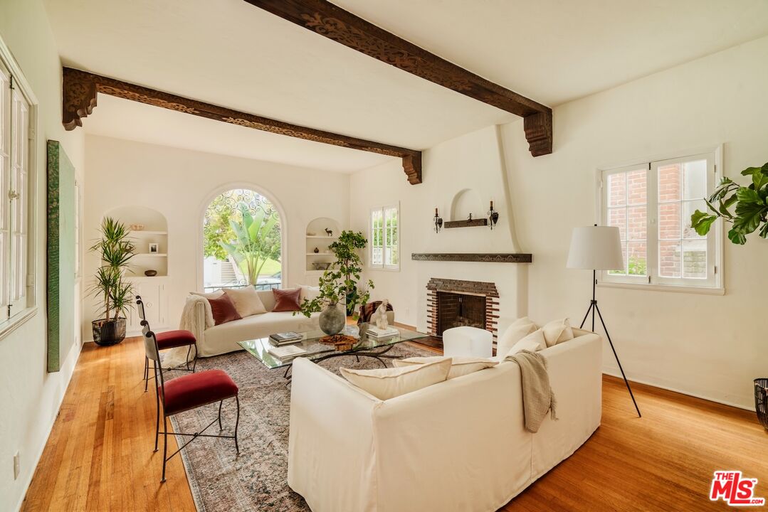 3325 Lowry Road Los Angeles, CA 90027 - Photo 13 of 73 a living room with furniture and a fireplace