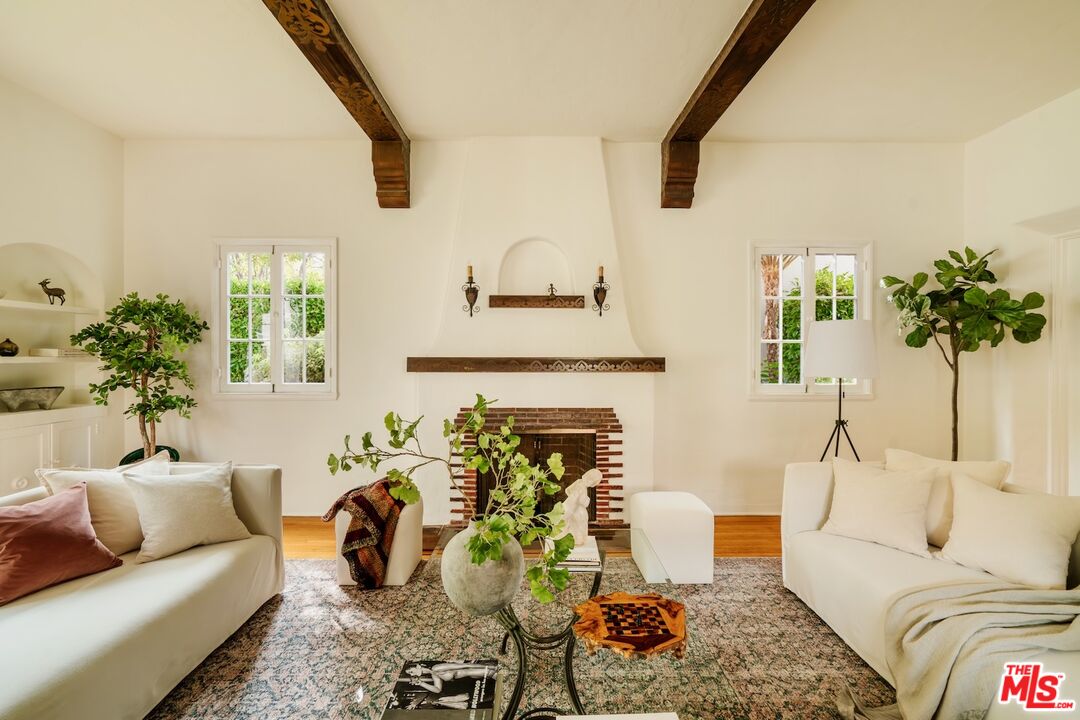 3325 Lowry Road Los Angeles, CA 90027 - Photo 15 of 73 a living room with furniture and a potted plant
