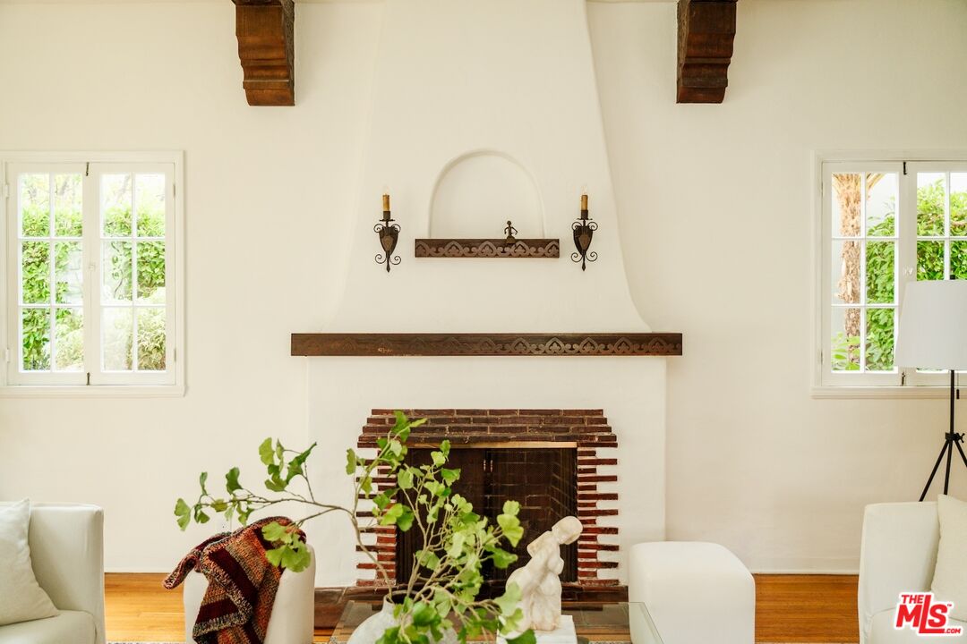 3325 Lowry Road Los Angeles, CA 90027 - Photo 16 of 73 a living room with furniture and a fireplace
