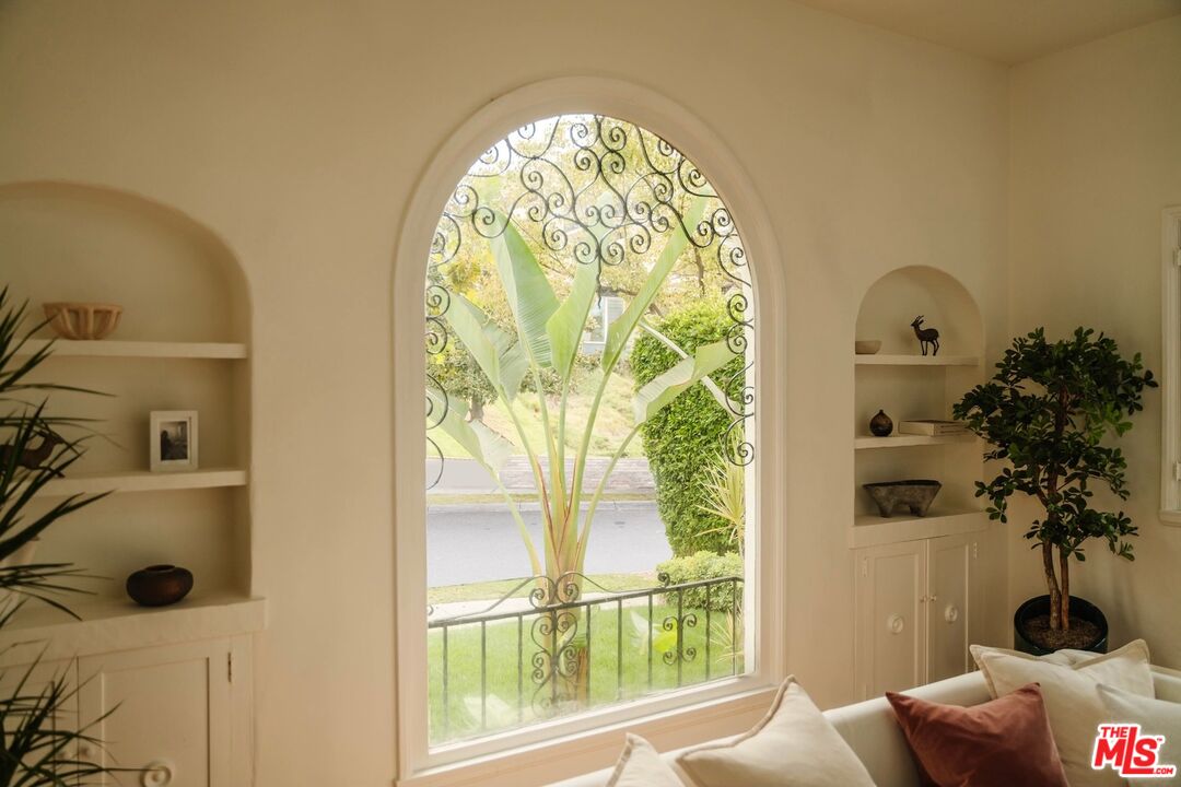 3325 Lowry Road Los Angeles, CA 90027 - Photo 20 of 73 a view of a floor to ceiling window and a swimming pool