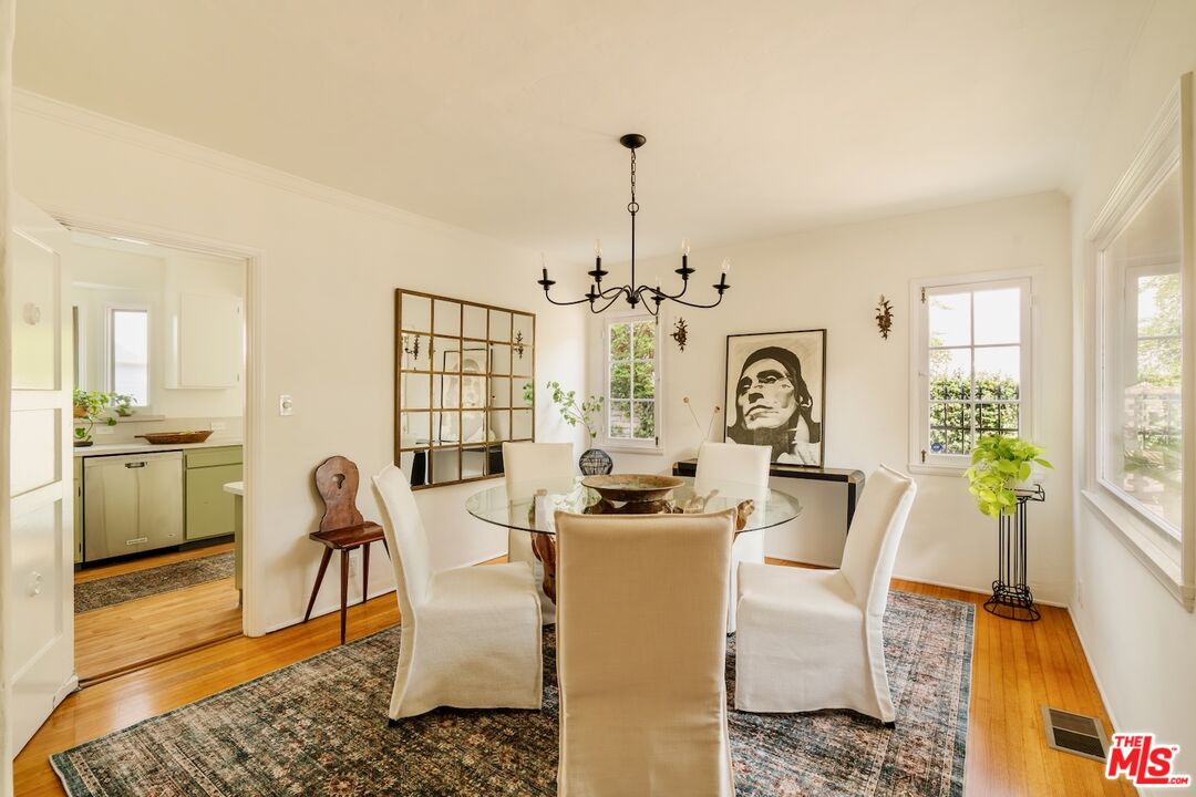 3325 Lowry Road Los Angeles, CA 90027 - Photo 22 of 73 a view of a dining room with furniture