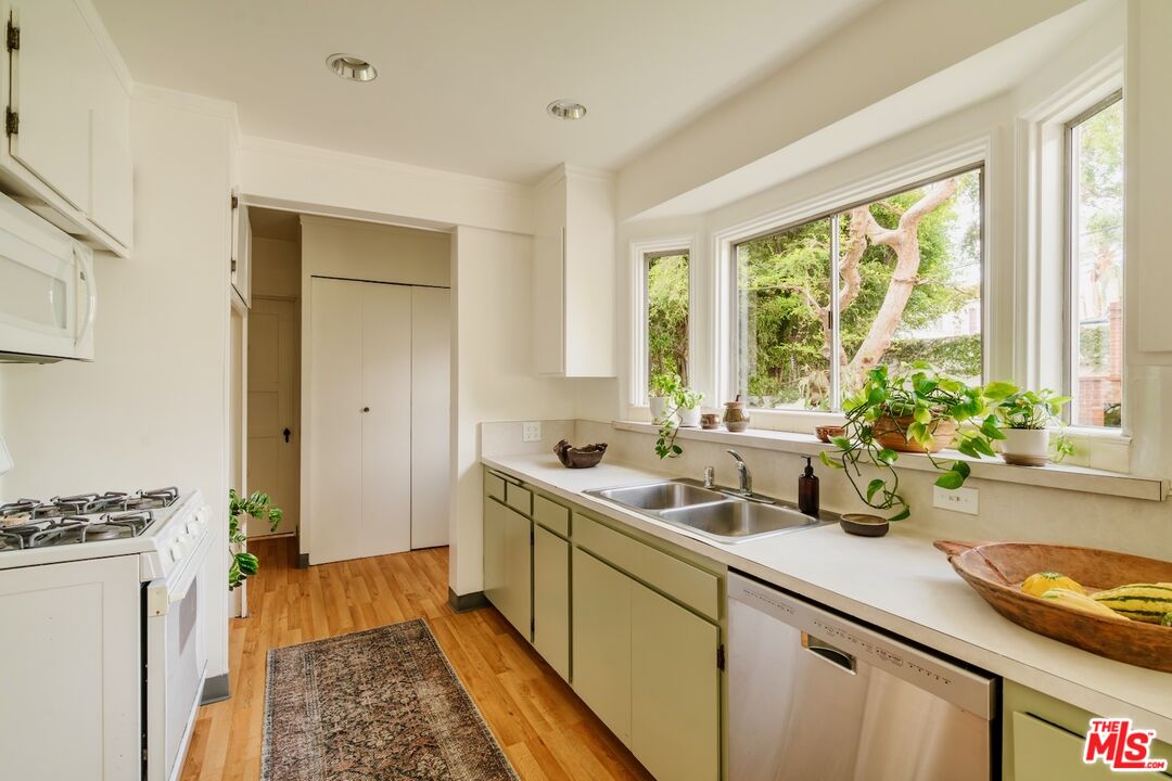 3325 Lowry Road Los Angeles, CA 90027 - Photo 29 of 73 a kitchen with a sink and a window