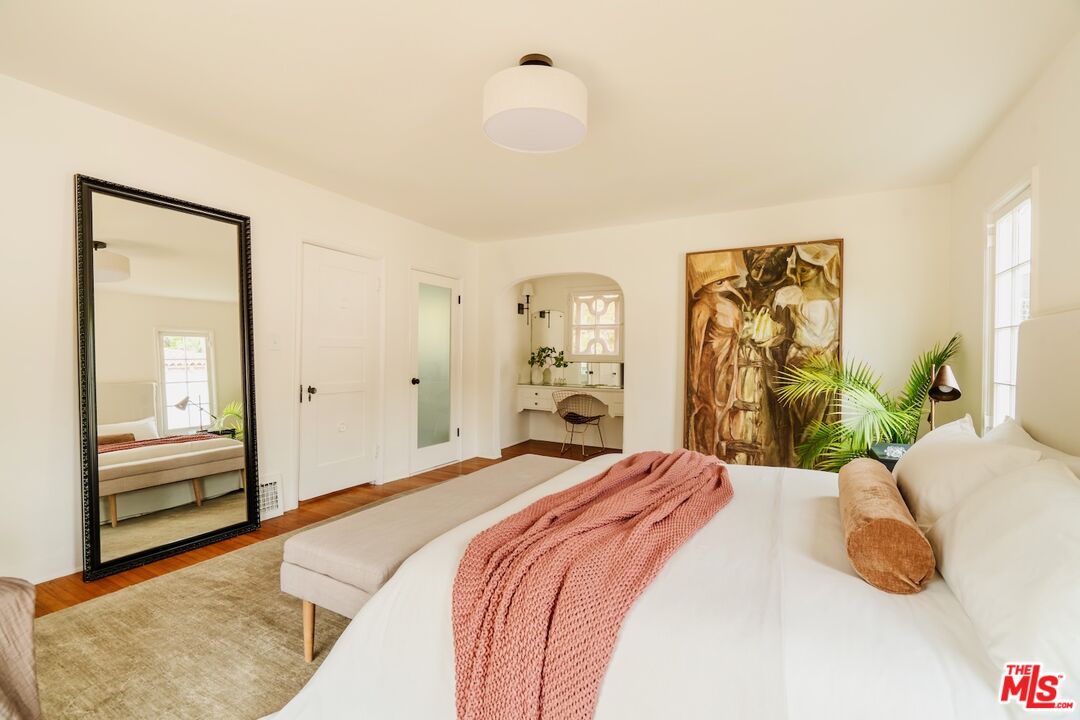 3325 Lowry Road Los Angeles, CA 90027 - Photo 36 of 73 a bedroom with a large bed and a window