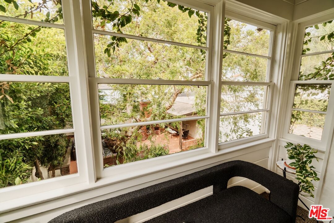 3325 Lowry Road Los Angeles, CA 90027 - Photo 52 of 73 a view of a window and a potted plant in front of a window