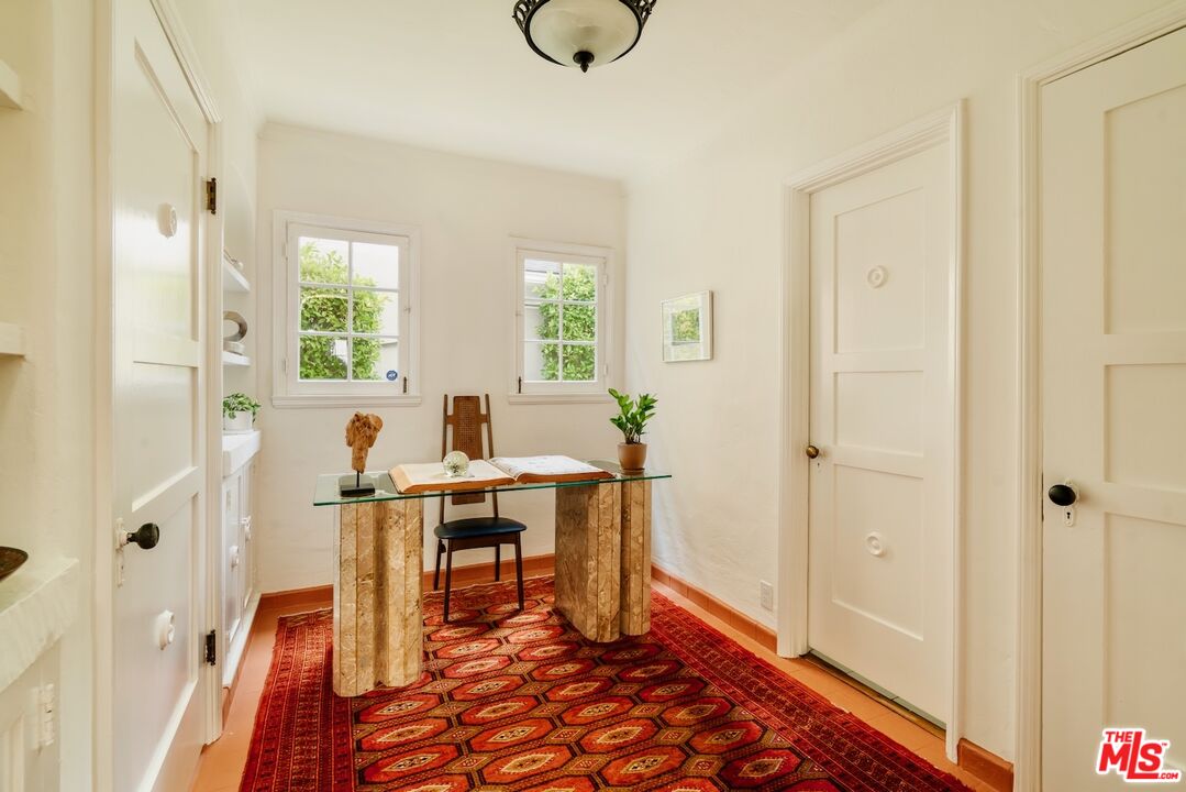 3325 Lowry Road Los Angeles, CA 90027 - Photo 56 of 73 a view of a livingroom with furniture window and wooden floor