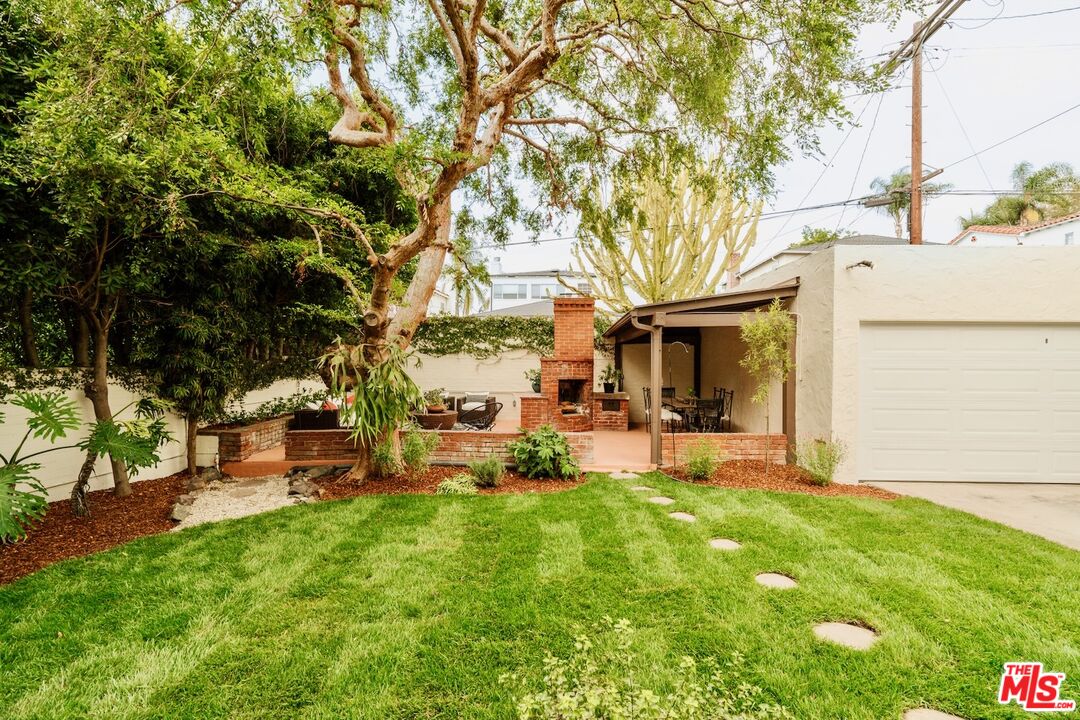 3325 Lowry Road Los Angeles, CA 90027 - Photo 60 of 73 a view of a house with backyard and sitting area