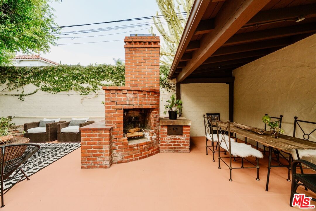 3325 Lowry Road Los Angeles, CA 90027 - Photo 65 of 73 a outdoor living space with patio furniture and a fireplace