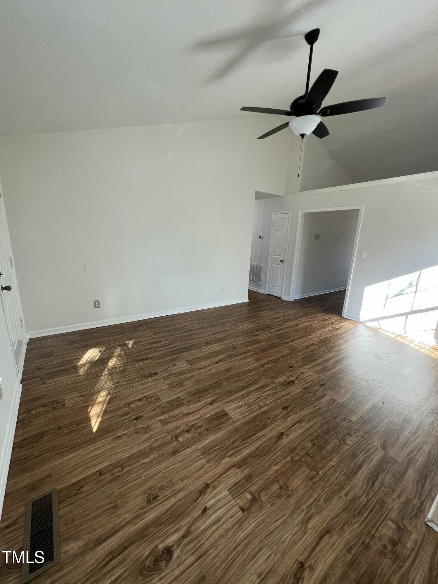 4416 Labrador Drive Raleigh, NC 27616 - Photo 3 of 19 a view of room with wooden floor