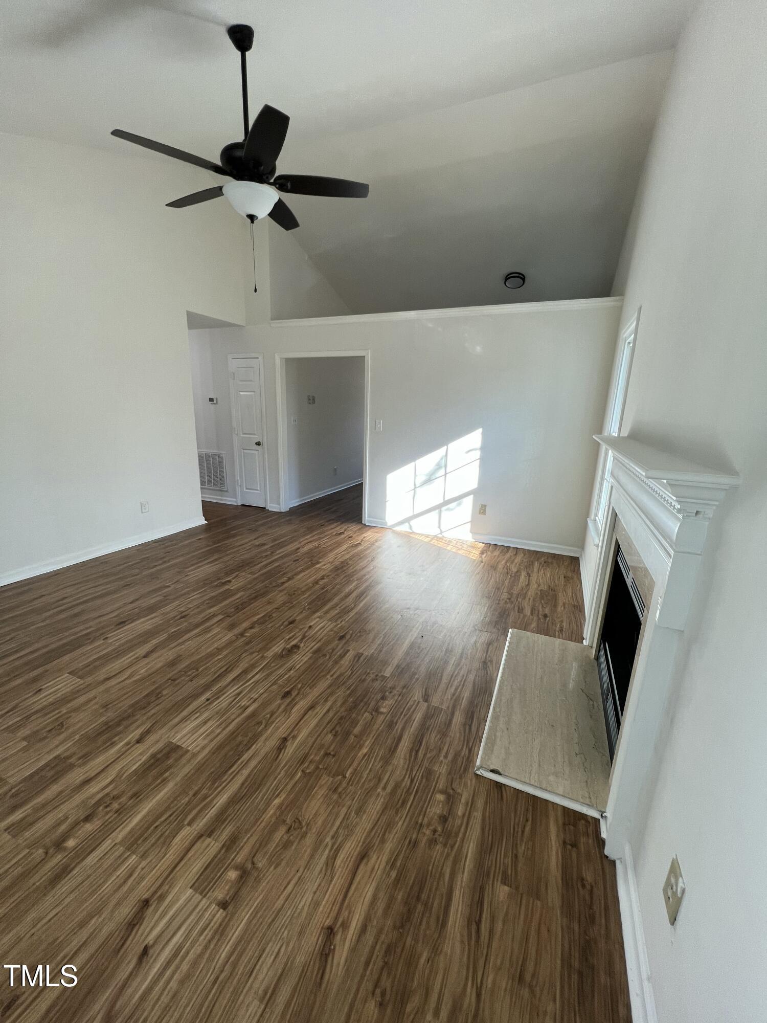 4416 Labrador Drive Raleigh, NC 27616 - Photo 4 of 19 a view of a livingroom with a fireplace