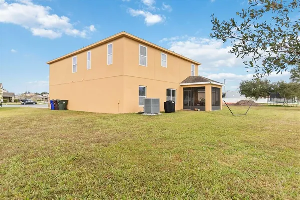 a front view of a house with swimming pool