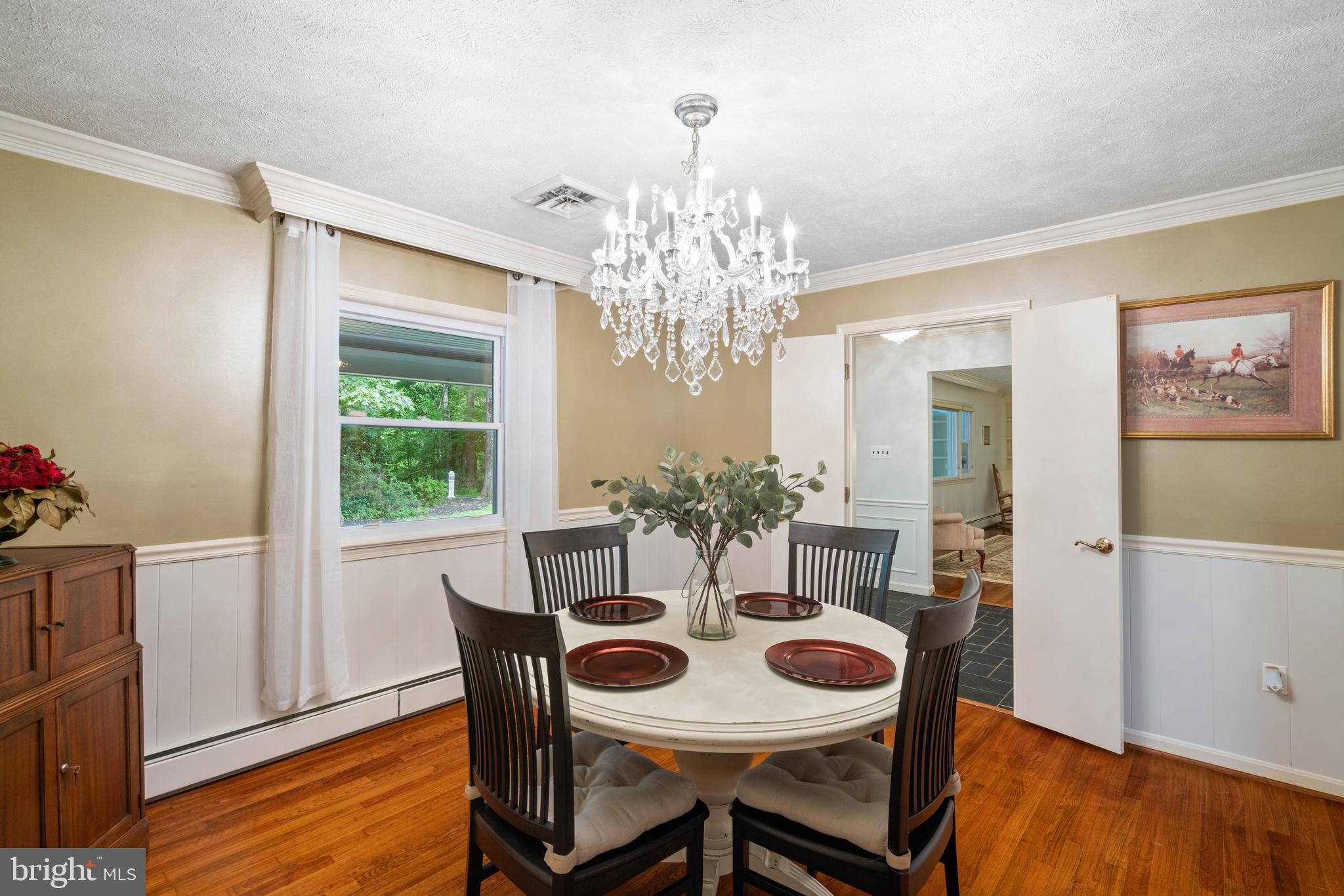 2617 Fox Mill Road Reston, VA 20191 - Photo 24 of 82 Crystal chandelier, crown and chair molding