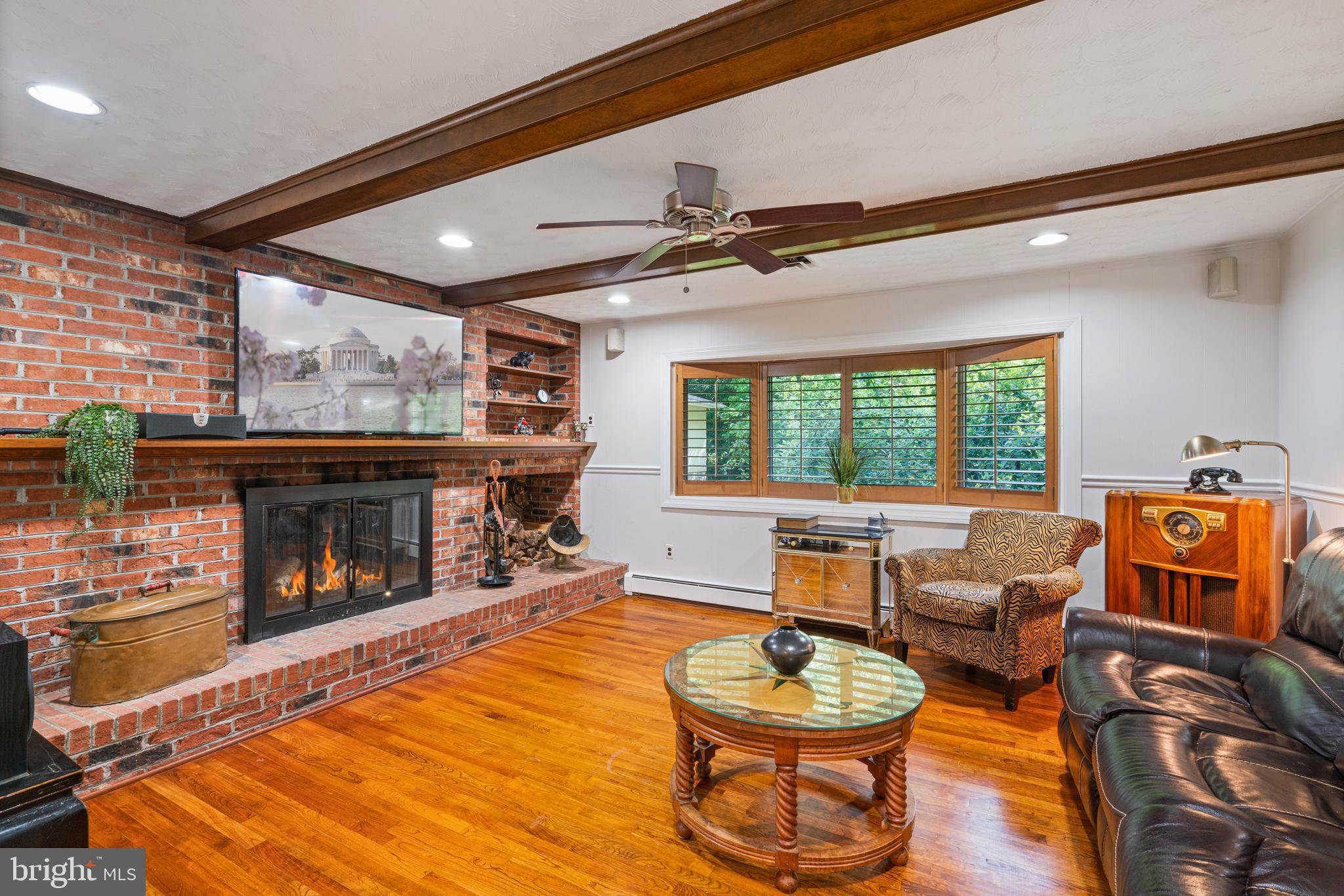 2617 Fox Mill Road Reston, VA 20191 - Photo 34 of 82 Family room off kitchen with plantation shutters
