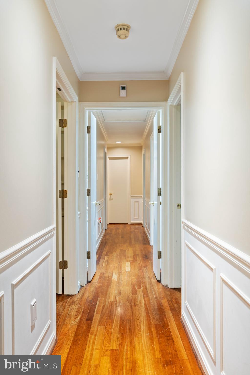 2617 Fox Mill Road Reston, VA 20191 - Photo 42 of 82 Hardwood floors and wainscoating down the hall