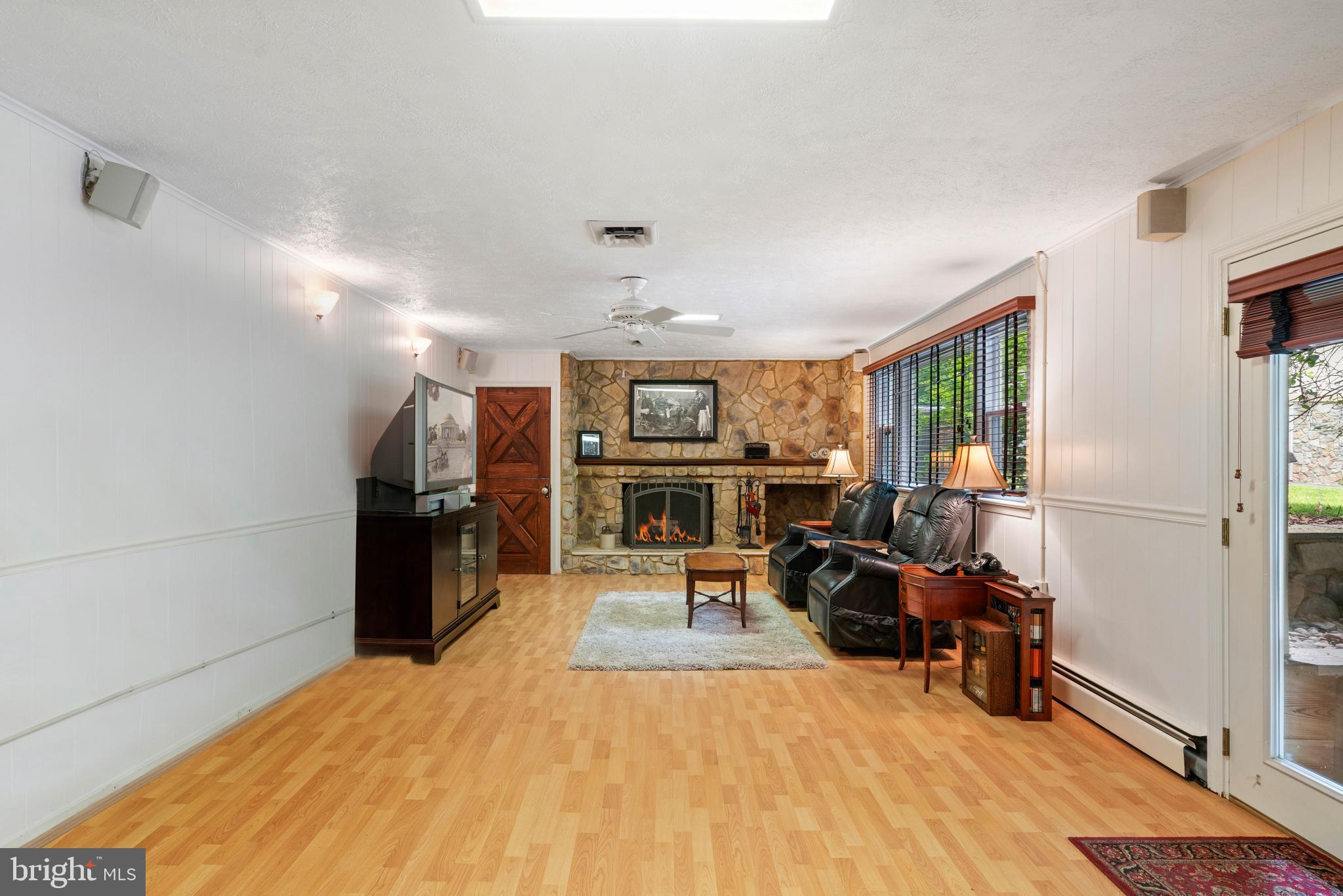 2617 Fox Mill Road Reston, VA 20191 - Photo 56 of 82 Lower level rec room with woodburning fireplace