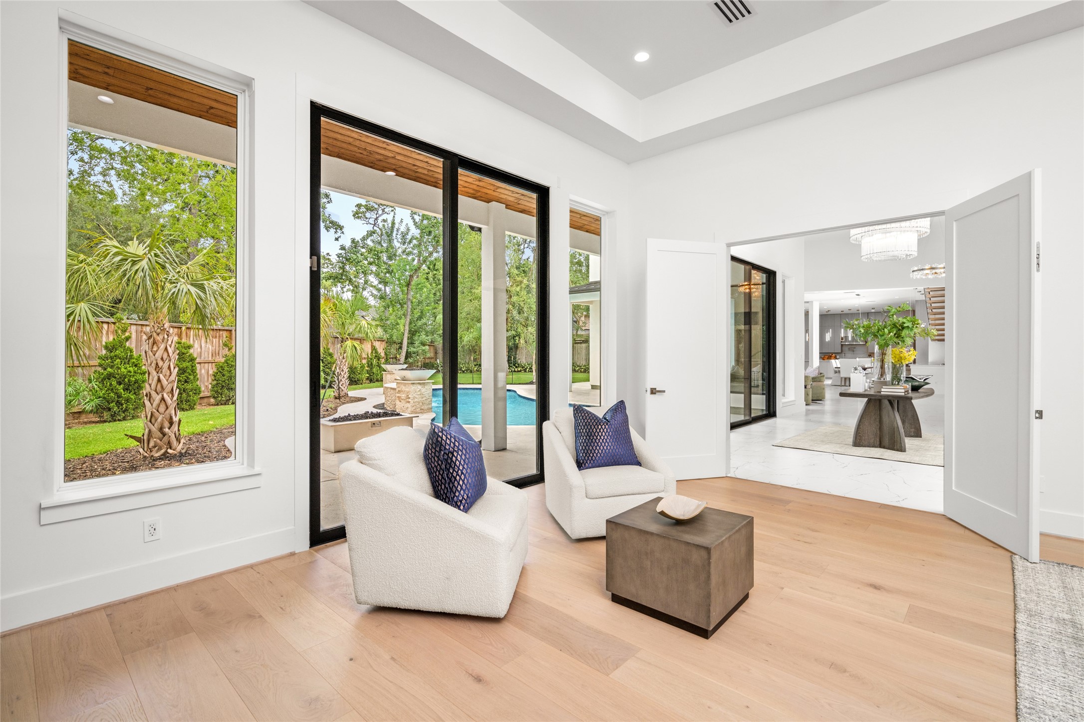 625 Piney Point Road Houston, TX 77024 - Photo 25 of 47 Sleek, remote-controlled ceiling fan and stunning 10-inch white oak floors add modern sophistication, while direct access invites you to unwind by the outdoor firepit or enjoy a refreshing morning swim.