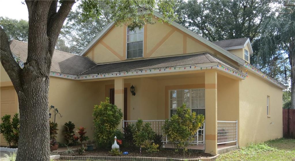 1428 Dew Bloom Road Valrico, FL 33594 - Photo 1 of 1 View of front showing the old fashioned porch to talk with neighbors