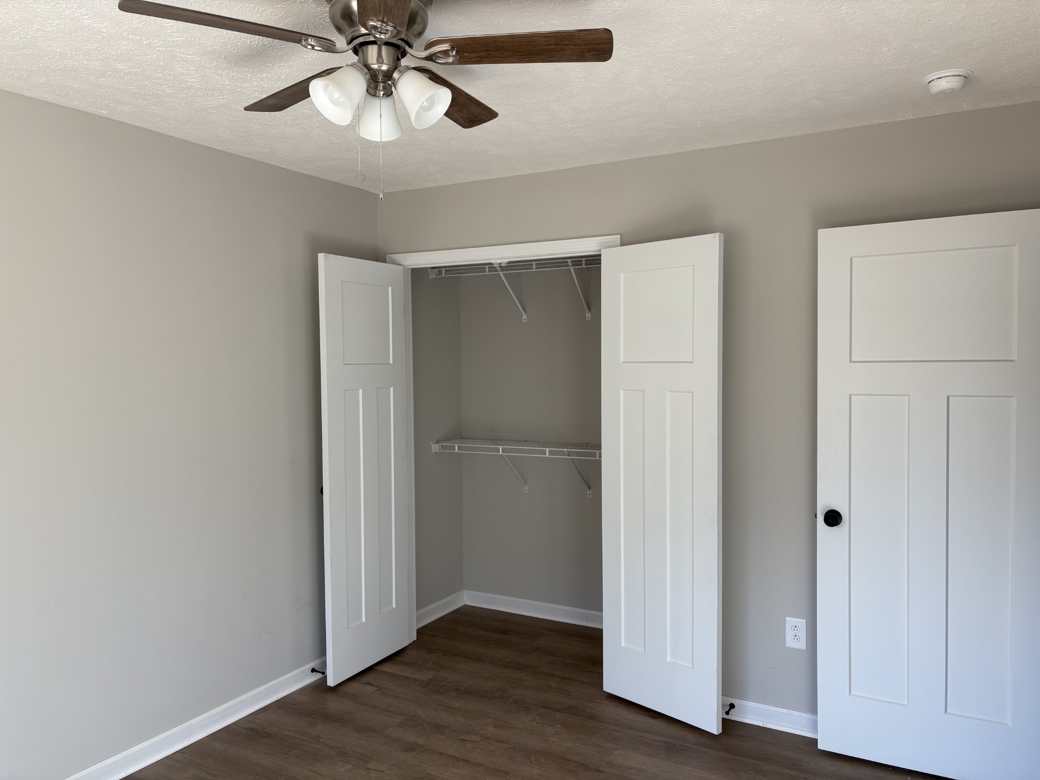 2260 Collier Road Cornersville, TN 37047 - Photo 9 of 15 a view of an empty room with wooden floor