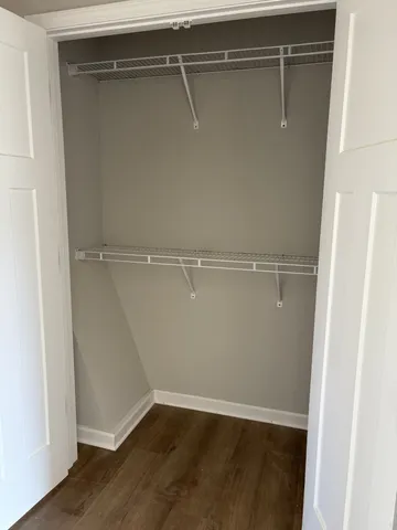 a view of an empty walk in closet
