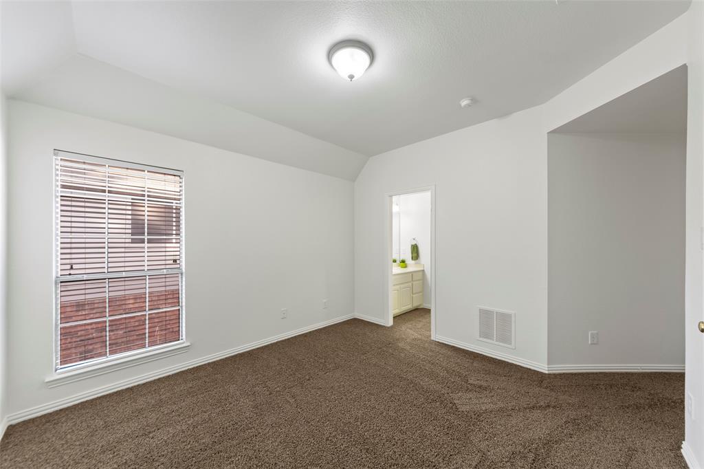 905 Sonora Drive Allen, TX 75013 - Photo 25 of 40 an empty room with windows
