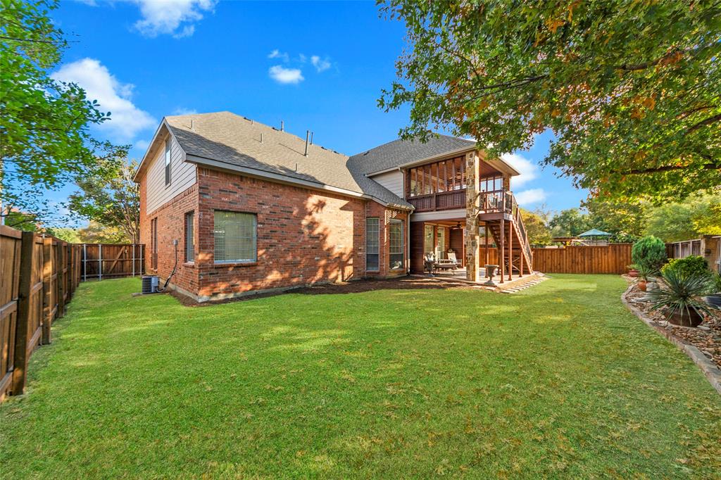 905 Sonora Drive Allen, TX 75013 - Photo 34 of 40 a view of a house with backyard and garden