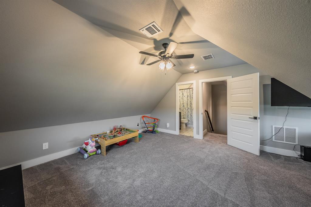2004 Feather Lane Weatherford, TX 76088 - Photo 29 of 40 a view of an empty room with a ceiling fan