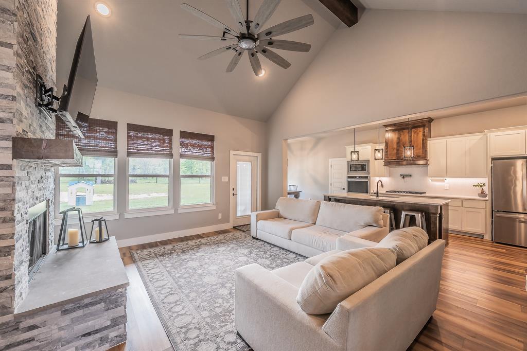 2004 Feather Lane Weatherford, TX 76088 - Photo 3 of 40 a living room with furniture and a large window