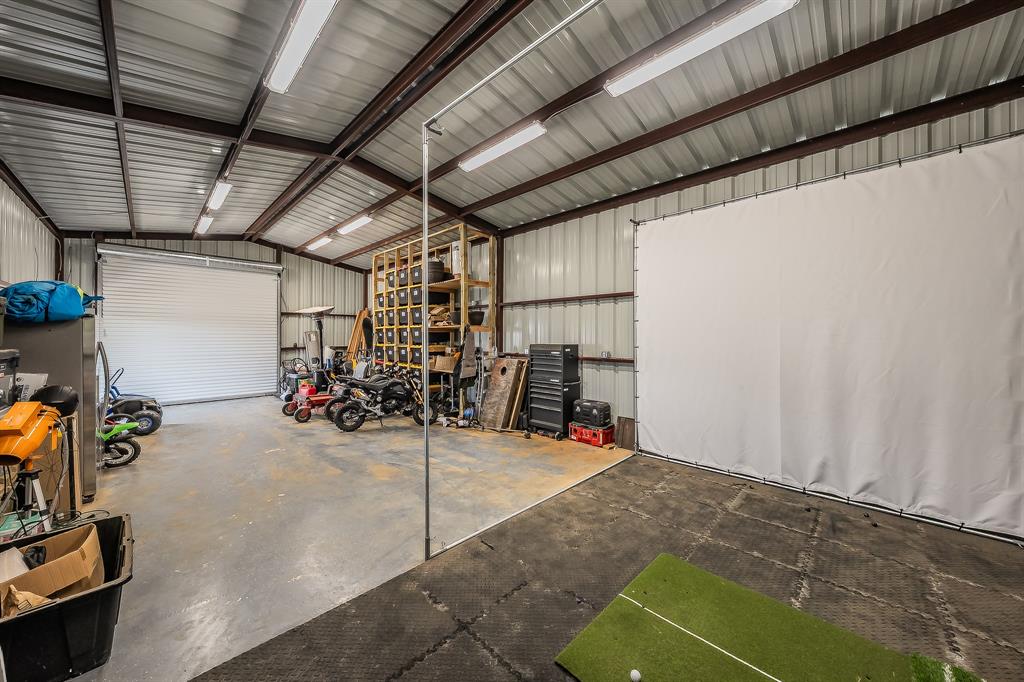 2004 Feather Lane Weatherford, TX 76088 - Photo 33 of 40 a view of a garage with rack and bicycle