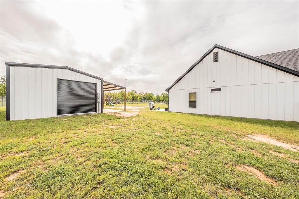 2004 Feather Lane Weatherford, TX 76088 - Photo 35 of 40 a view of an house with backyard