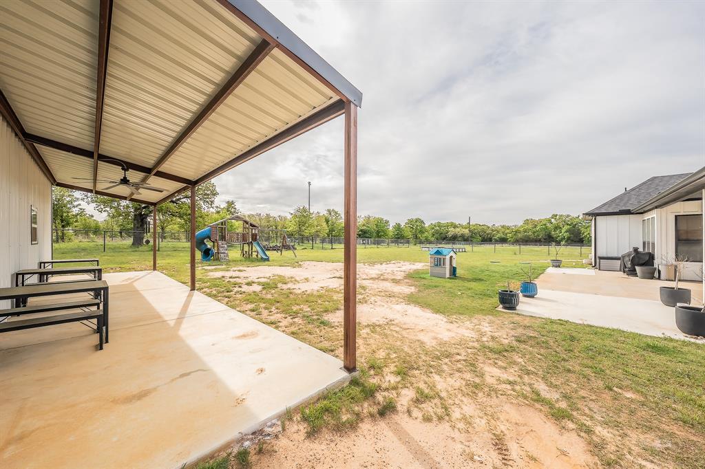 2004 Feather Lane Weatherford, TX 76088 - Photo 36 of 40 a view of a swimming pool with a patio
