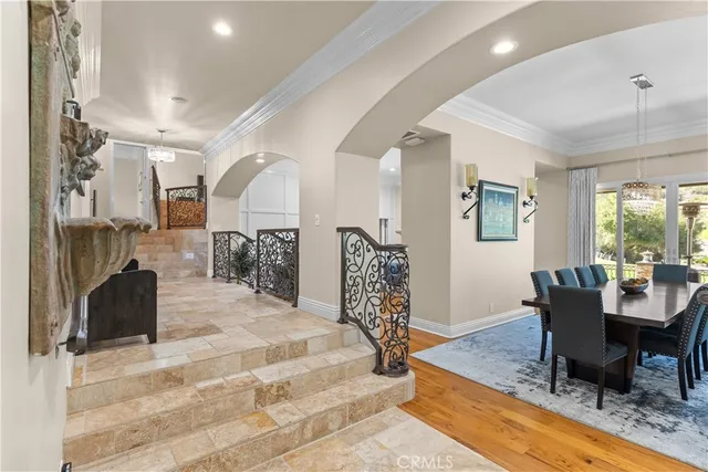 a large kitchen with a table and chairs