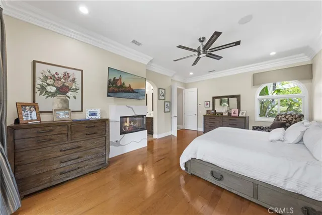 a living room with furniture window and a flat screen tv