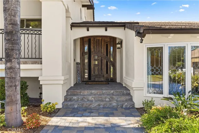 a kitchen with a stove a counter top space and cabinets