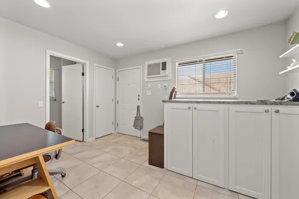 a view of a kitchen with a sink