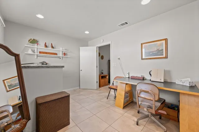 a workspace with furniture and window