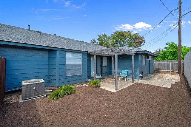 a front view of a house with patio