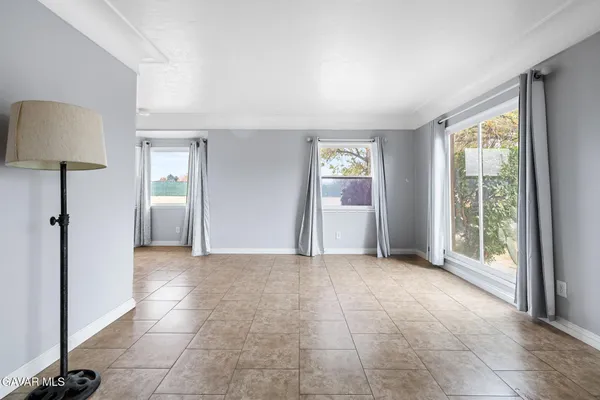 a view of a livingroom with a staircase